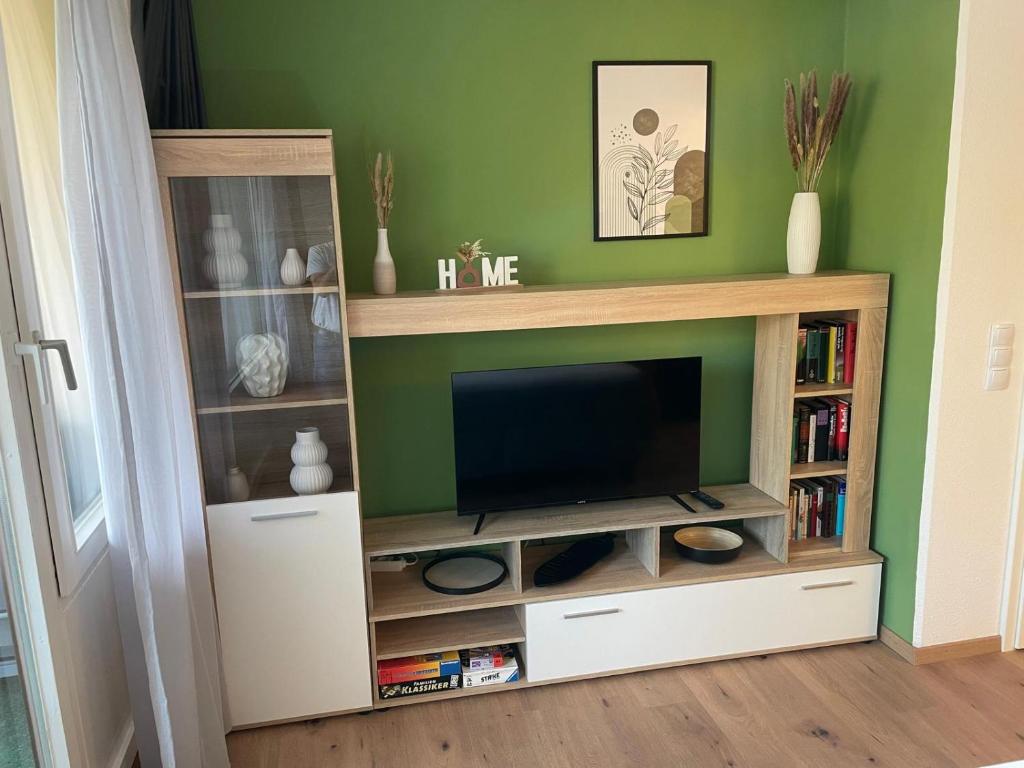 TV a/nebo společenská místnost v ubytování Ausblick in den Bayerischen Wald - Moderne Ferienwohnung