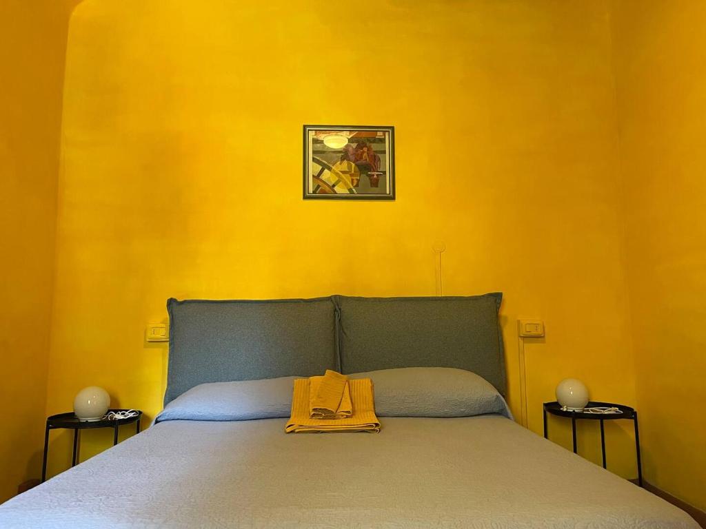 Postel nebo postele na pokoji v ubytování Gelso Moro Fashionable Stay in the Old Garden