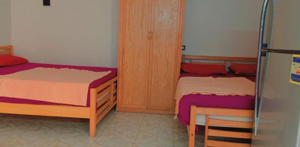 Postel nebo postele na pokoji v ubytování Seaview Honeymoon Escape- Studio