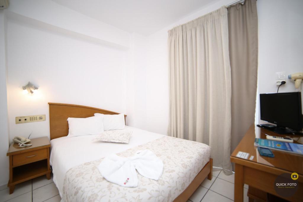 Posteľ alebo postele v izbe v ubytovaní Astali Hotel