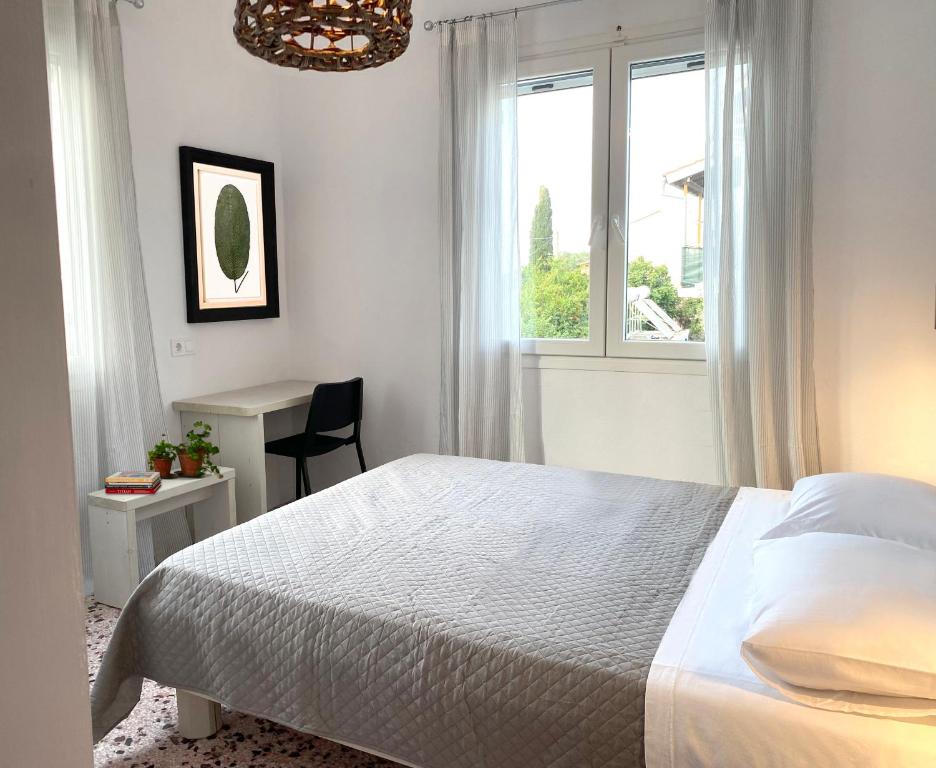Postel nebo postele na pokoji v ubytování TRIGONO residencies
