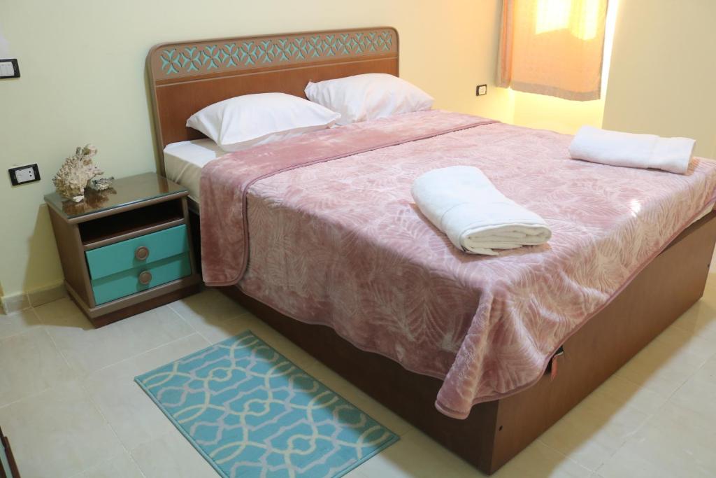 Ένα ή περισσότερα κρεβάτια σε δωμάτιο στο Dolphin suites apartment