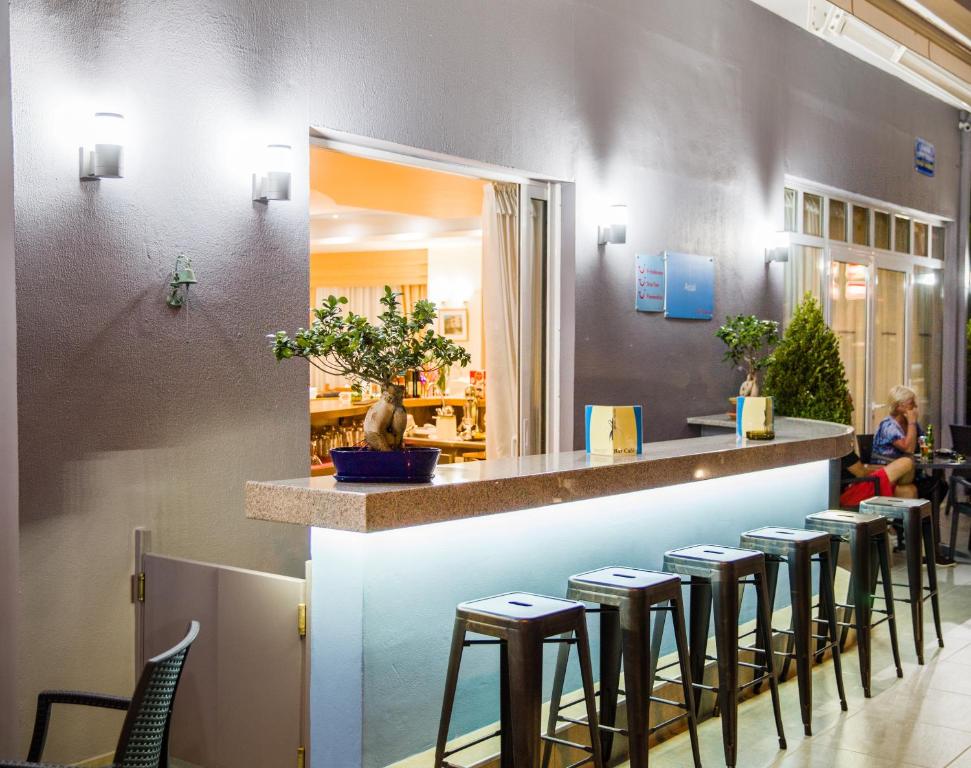 Reštaurácia alebo iné gastronomické zariadenie v ubytovaní Astali Hotel