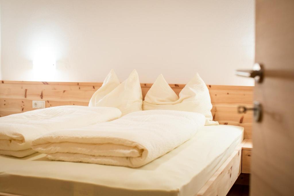 Postel nebo postele na pokoji v ubytování Brugger Hof