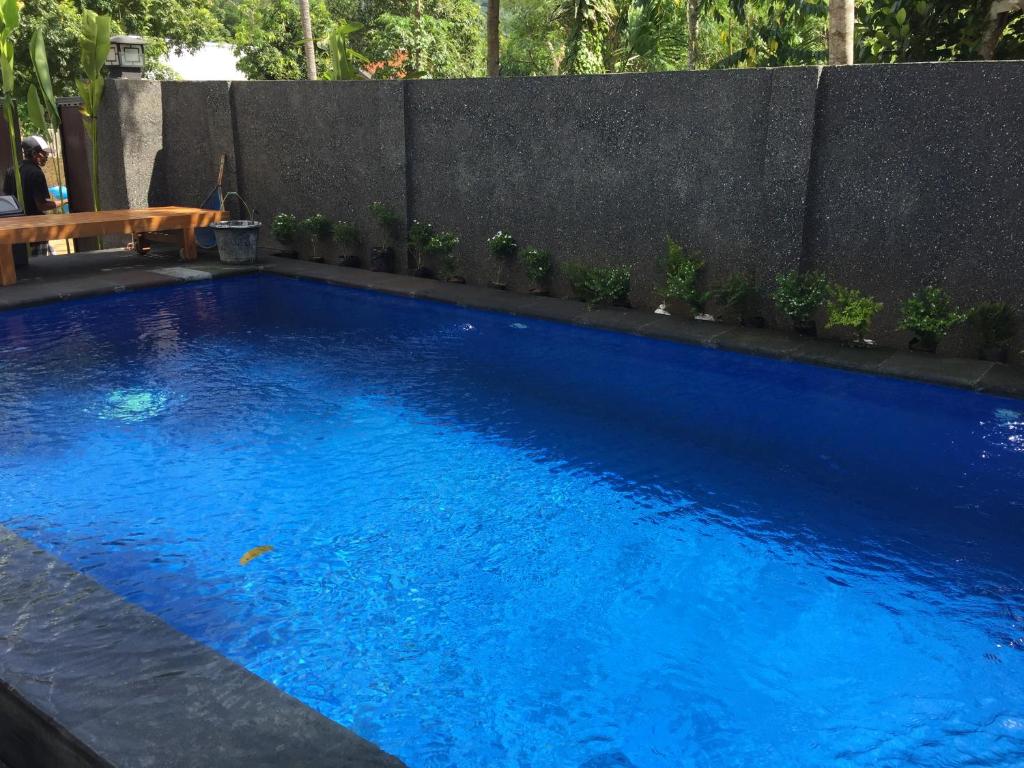 Bazén v ubytování Lazy Inn Kuta Lombok nebo v jeho okolí