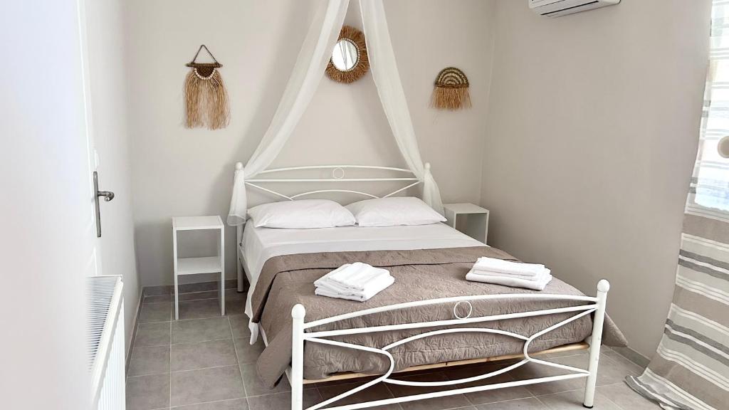 Postel nebo postele na pokoji v ubytování The Boho Nest
