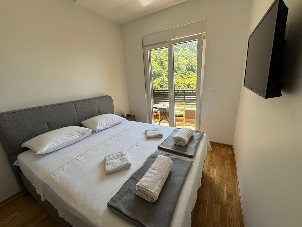 Ένα ή περισσότερα κρεβάτια σε δωμάτιο στο Comfort Stylish Apartment IVSOLE
