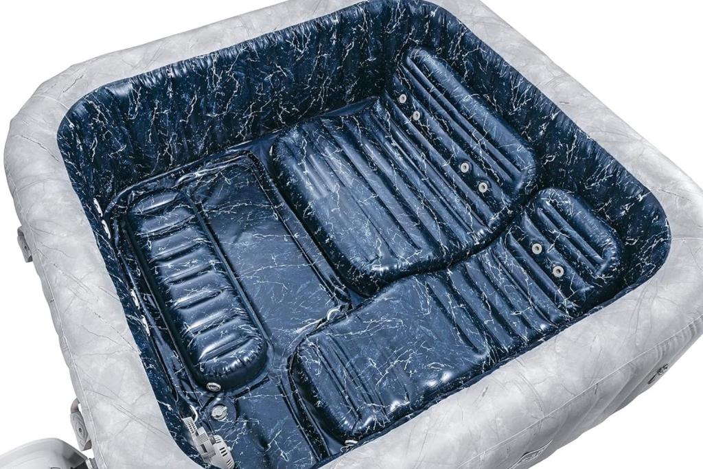 a close up of a blue leather wallet at Chez Pascal et Louna au calme avec Jacuzzi ! Proche PARIS et RER B et CDG AÉROPORT in Sevran