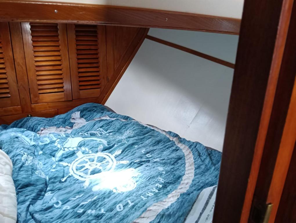 a bed in the back of a boat at Deluxe romantic boat in Hoogeveen