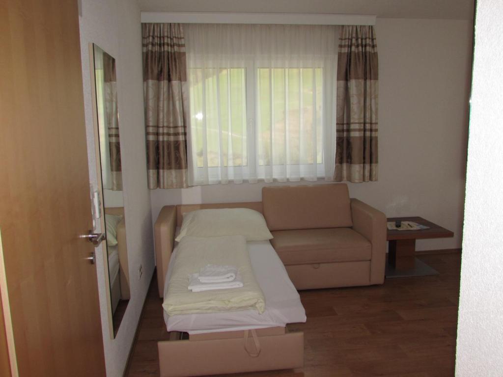 Postel nebo postele na pokoji v ubytování Apart Alexandra