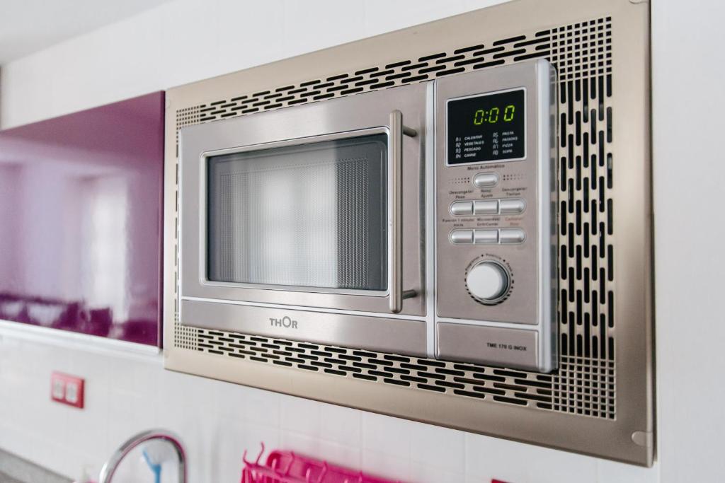 Kuchyň nebo kuchyňský kout v ubytování Apartamentos Tito San Agustin