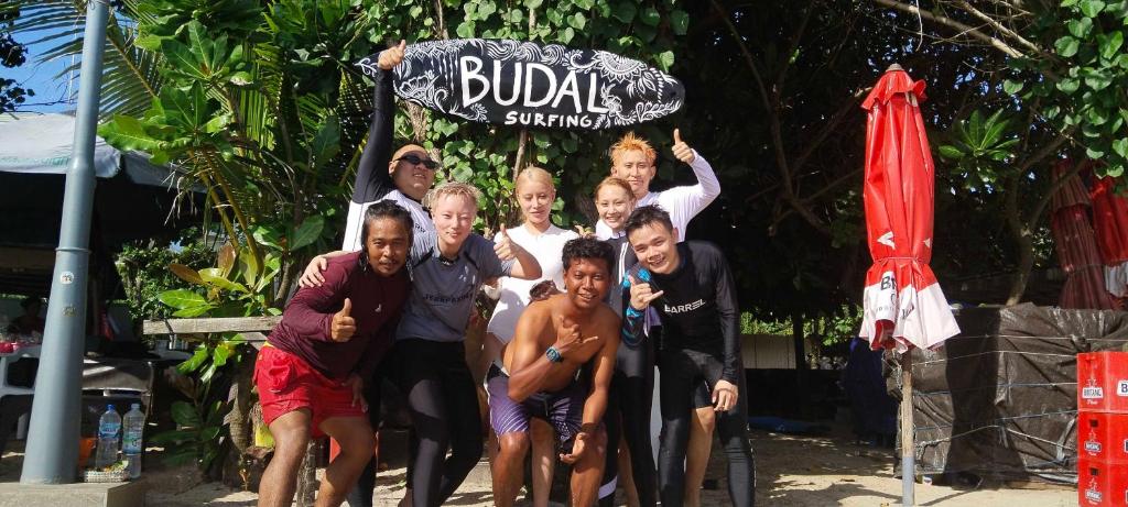 a group of people posing for a picture at Budal surfing in Legian