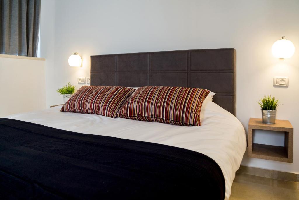 Postel nebo postele na pokoji v ubytování Johnny Hotel