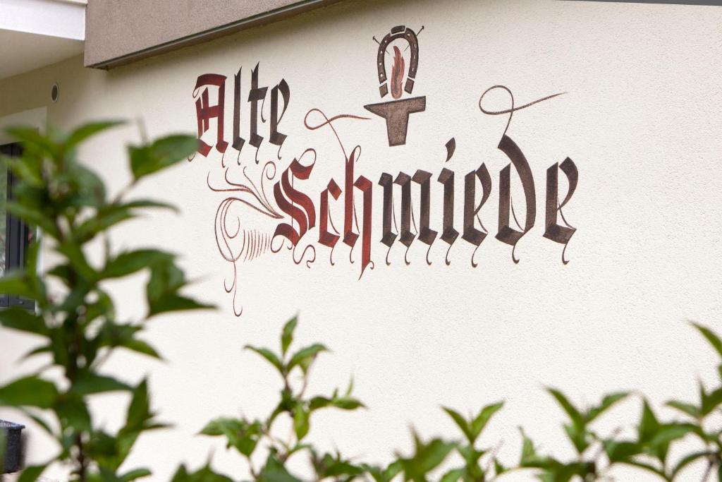 a sign on the side of a building that reads big saturday at Alte Schmiede in Nauders