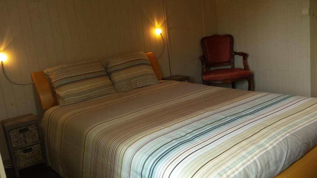 Postel nebo postele na pokoji v ubytování Vakantieverblijf Strandgaper