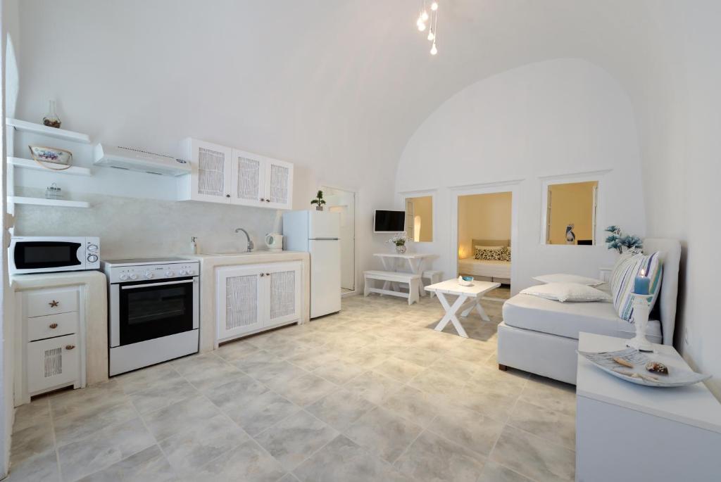 Kuchyň nebo kuchyňský kout v ubytování Dream Island Hotel