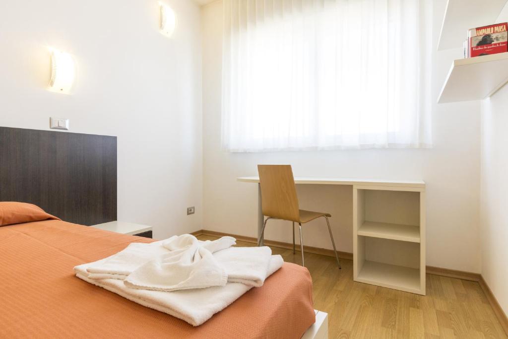 Postel nebo postele na pokoji v ubytování Hotel Sharing
