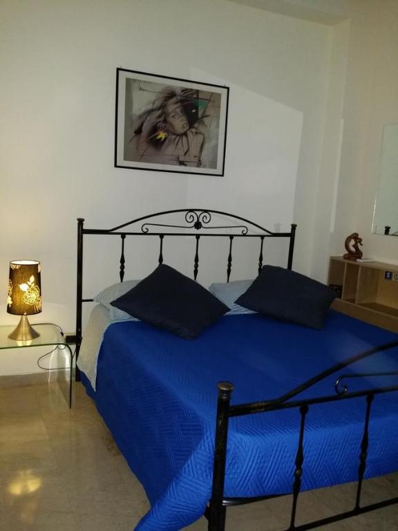 Łóżko lub łóżka w pokoju w obiekcie Aparthotel TURNONE