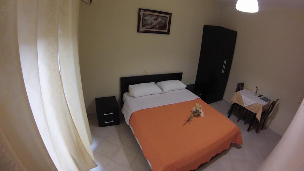 Postel nebo postele na pokoji v ubytování Hotel 4 Stinet