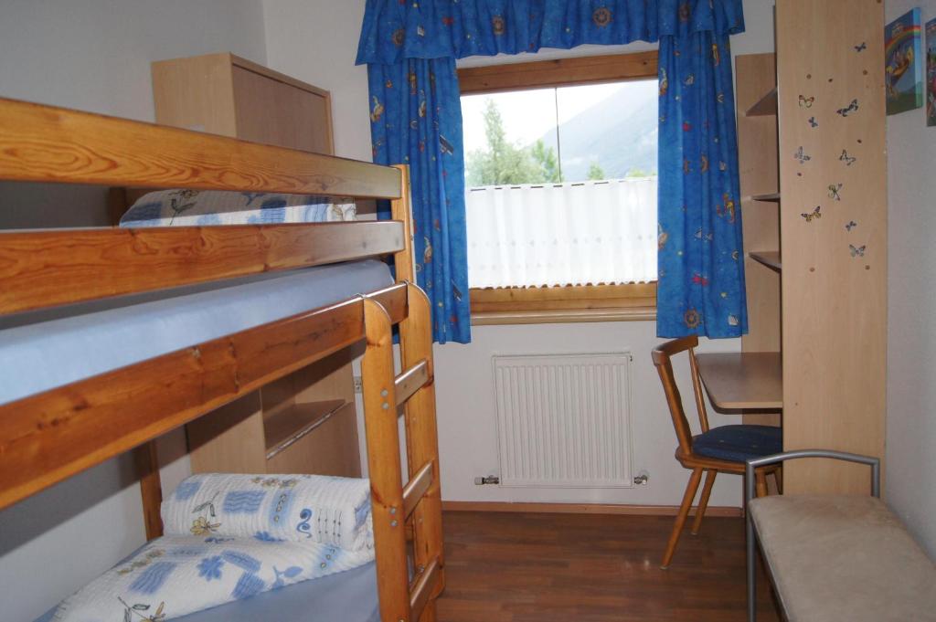 Postel nebo postele na pokoji v ubytování Haus Reiterer