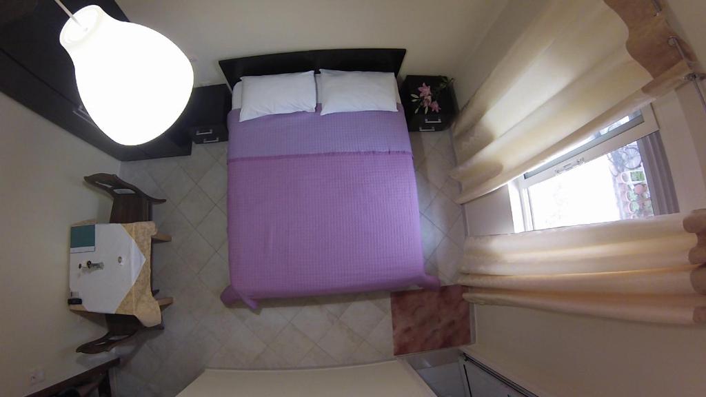 Postel nebo postele na pokoji v ubytování Hotel 4 Stinet