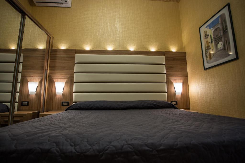 Postel nebo postele na pokoji v ubytování Hotel Vela D'oro ***S