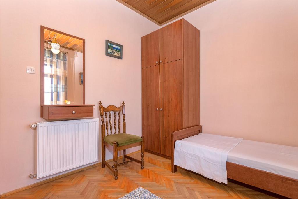 Posteľ alebo postele v izbe v ubytovaní Holiday Home Leonida