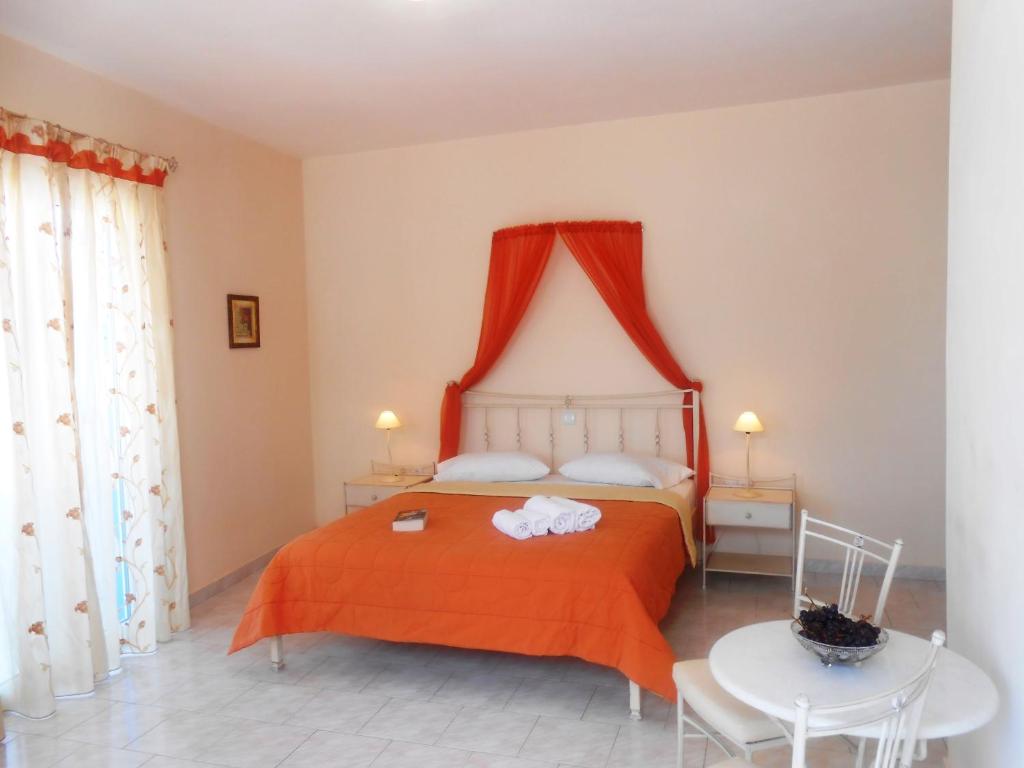 A bed or beds in a room at Livanios Studios