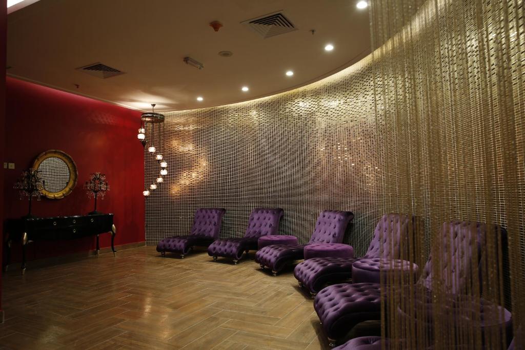 Posezení v ubytování Adams Hotel