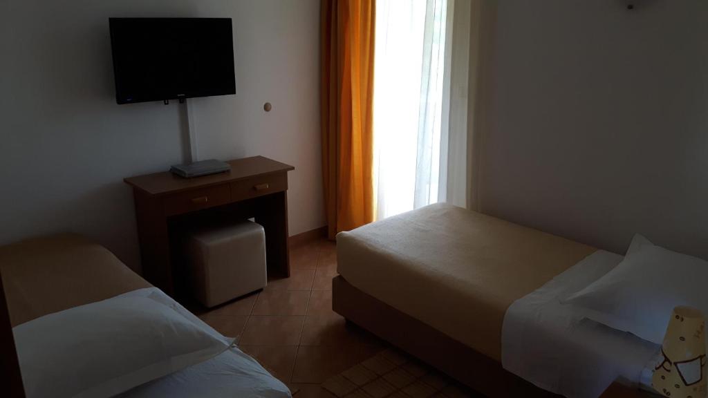 Postel nebo postele na pokoji v ubytování Motel Janković