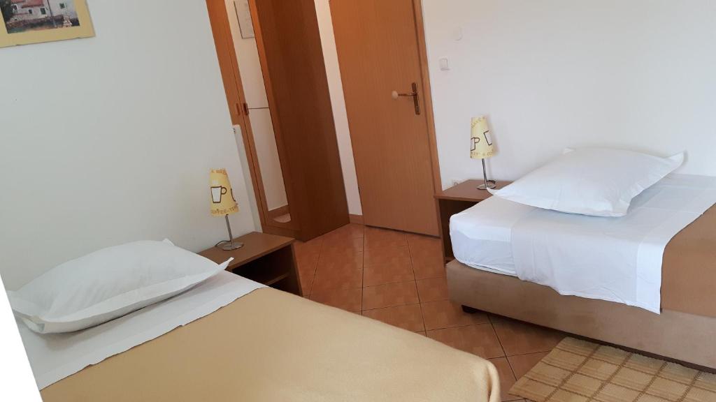 Postel nebo postele na pokoji v ubytování Motel Janković