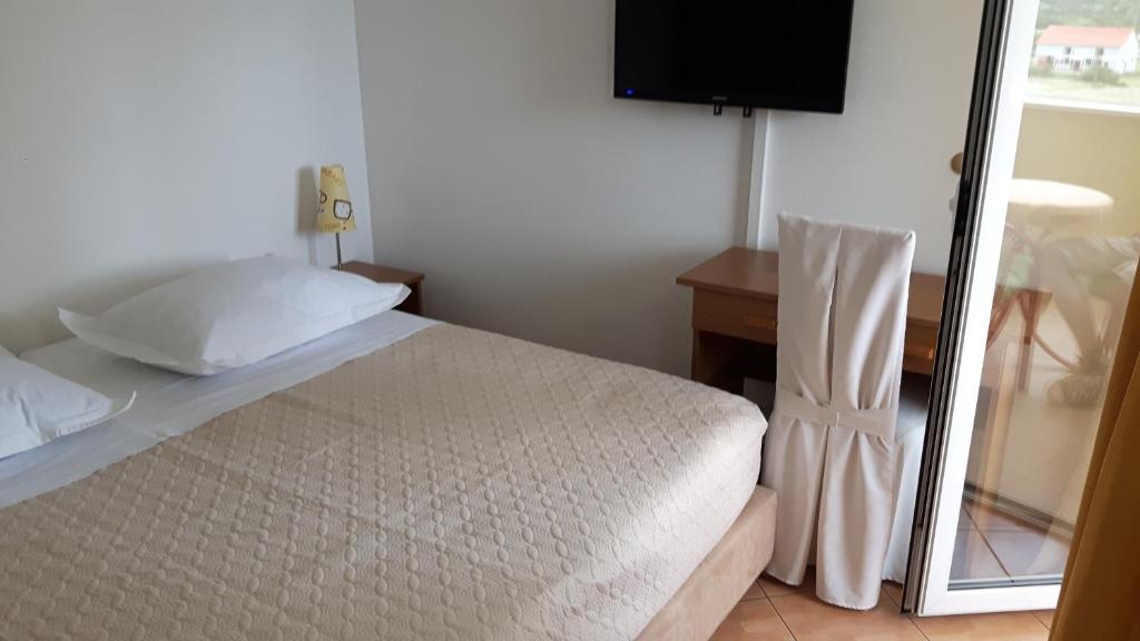 Postel nebo postele na pokoji v ubytování Motel Janković