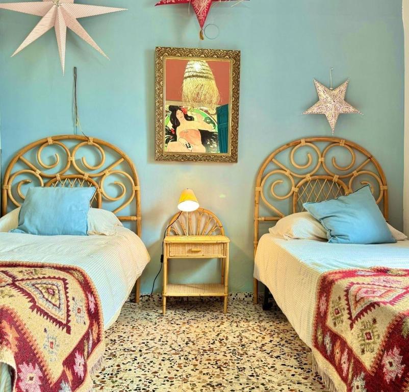 Postel nebo postele na pokoji v ubytování La casita de Denis