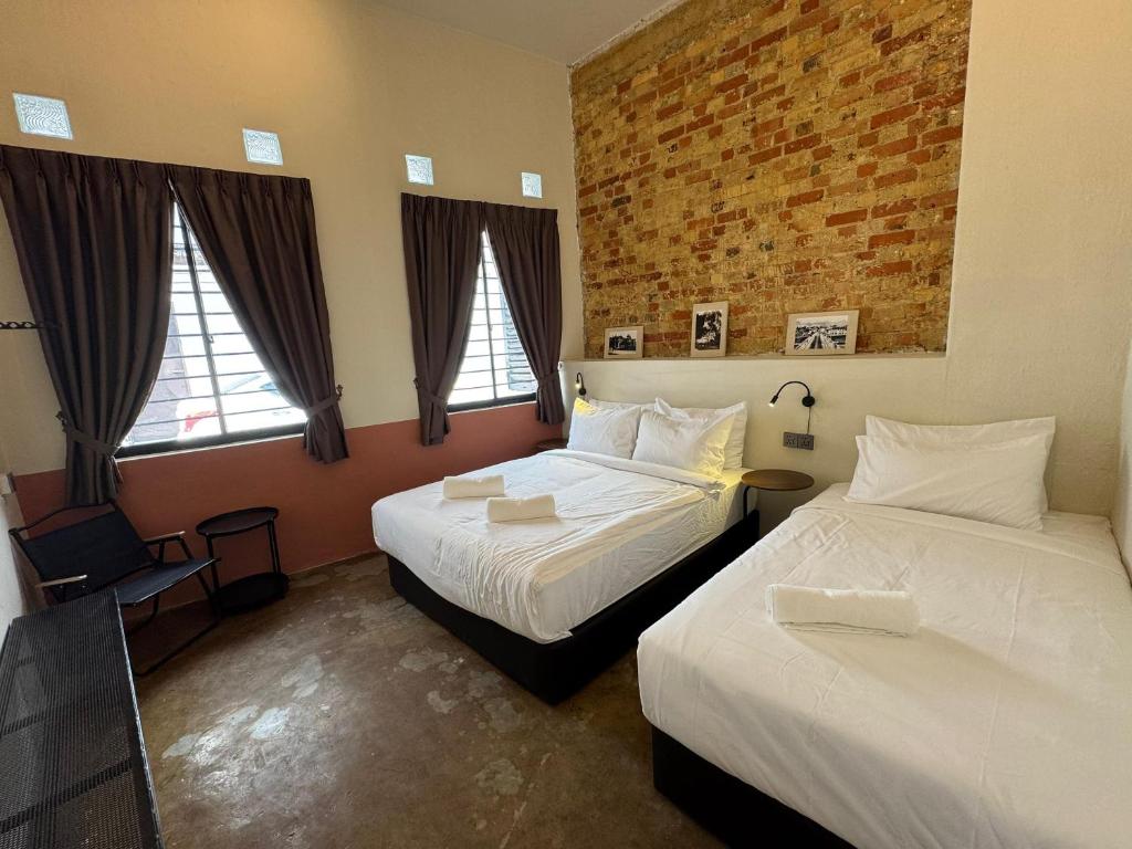 Miner's House Ipoh - Quarto Triplo Com Banheiro Compartilhado