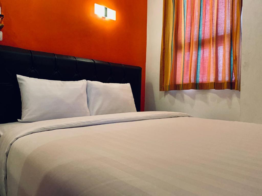 NiHOTEL Cibaduyut Bandung - Habitación Deluxe (2 Adultos + 1 Niño)