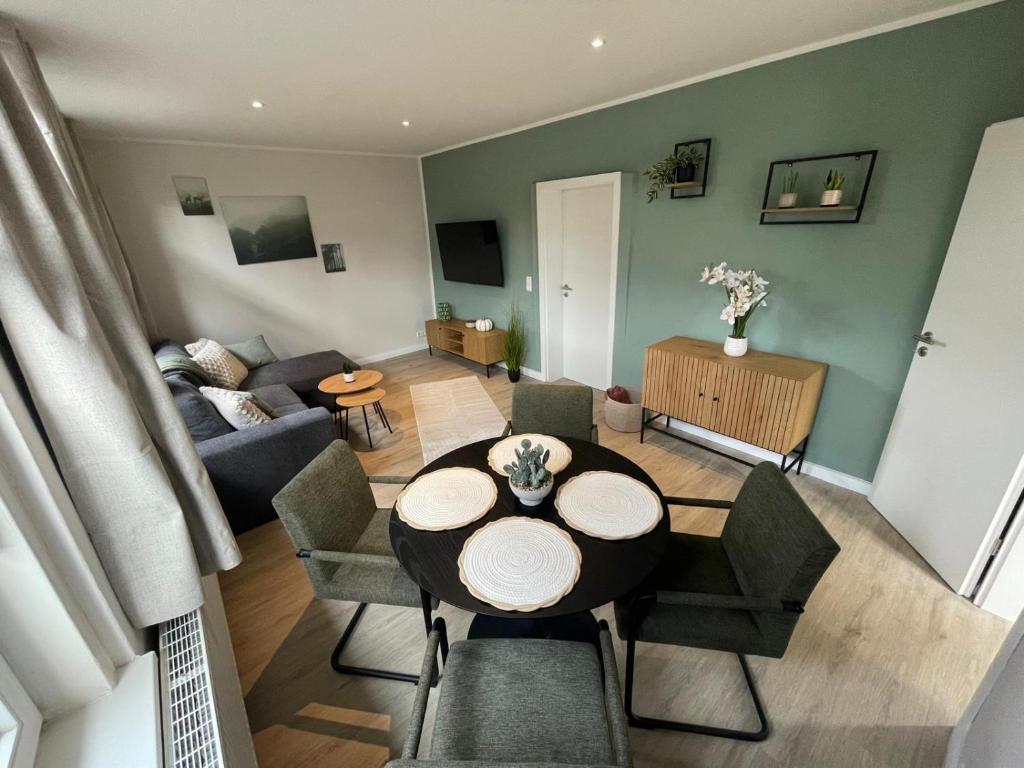 Et opholdsområde på Cottage Cozy Gästehaus