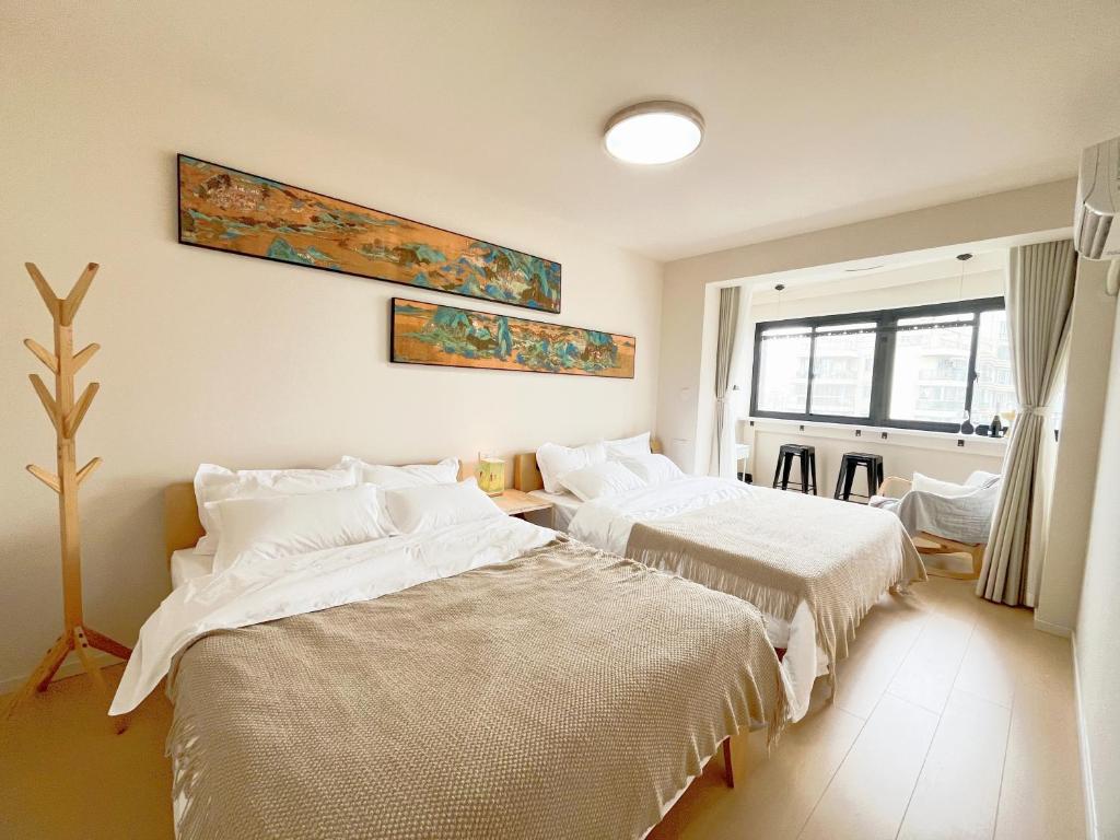 Postel nebo postele na pokoji v ubytování Uffice apartment