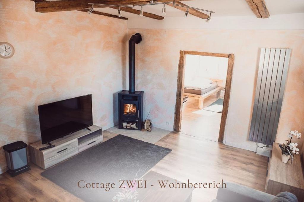 TV a/nebo společenská místnost v ubytování Cottage Gut Nüxei
