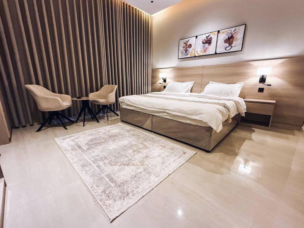 Ένα ή περισσότερα κρεβάτια σε δωμάτιο στο GUEST HOUSe