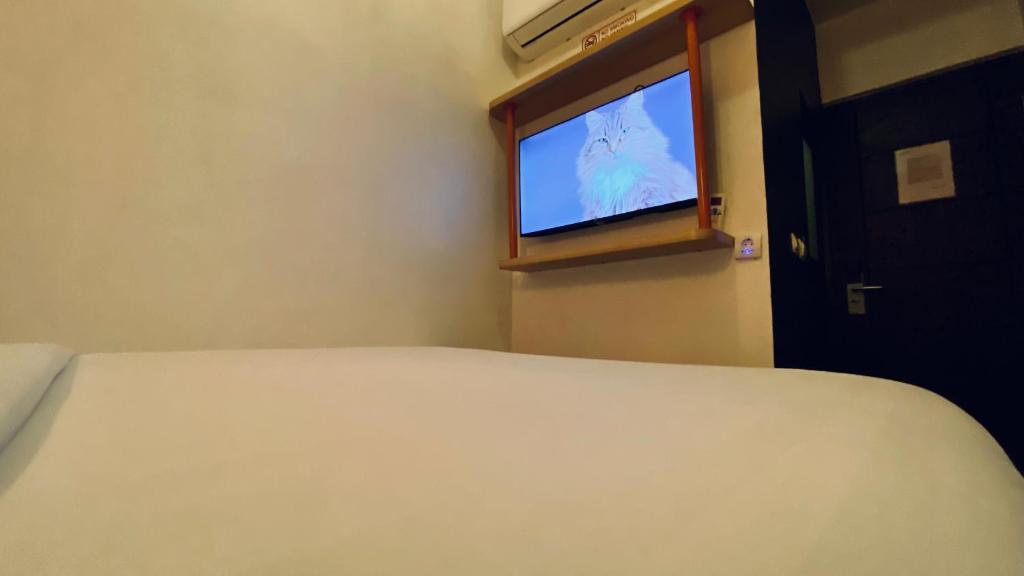 NiHOTEL Cibaduyut Bandung - Habitación Doble Deluxe (2 Adultos + 1 Niño)