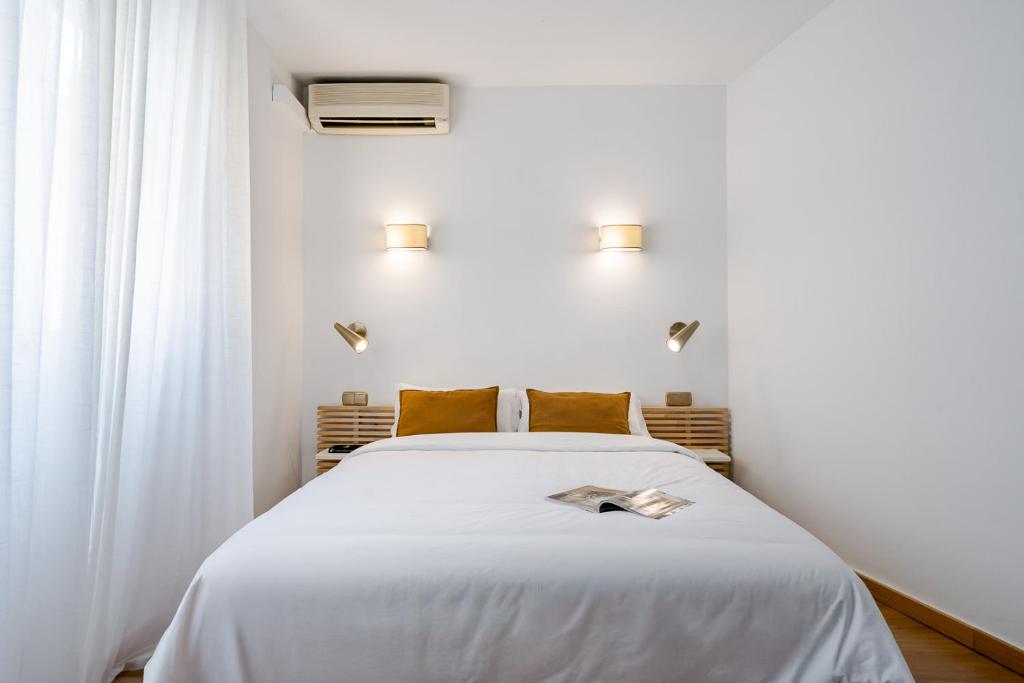 Posteľ alebo postele v izbe v ubytovaní Hotel Agur