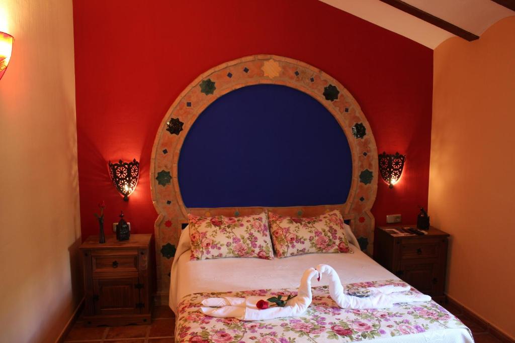 Giường trong phòng chung tại Hotel Rural Valle del Turrilla - Cazorlatur