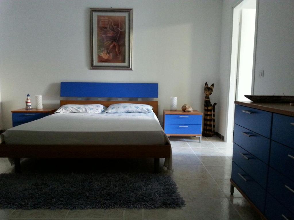 Postel nebo postele na pokoji v ubytování Corte Dei Messapi