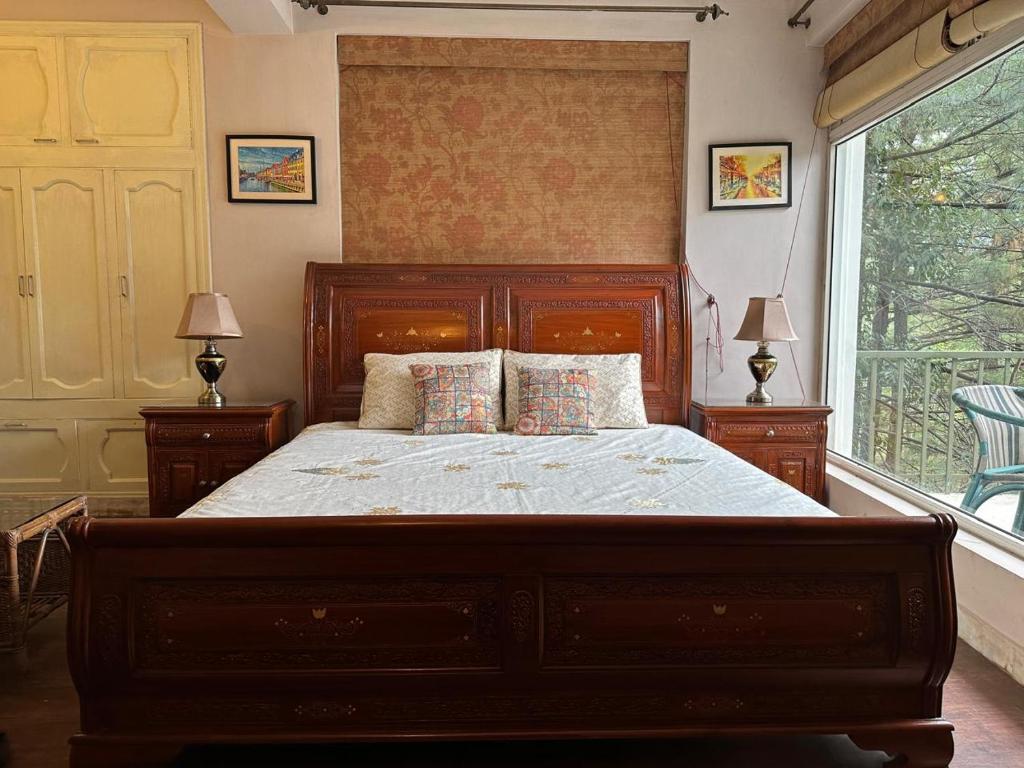 Кровать или кровати в номере Holiday Apartments