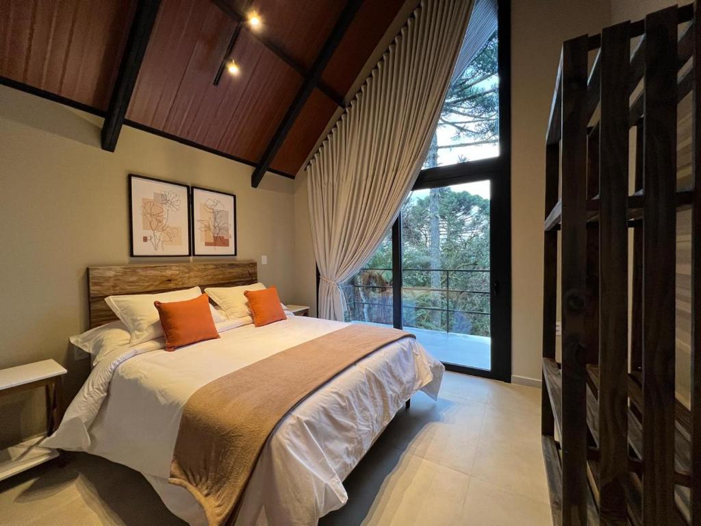 Pousada Caminho das Araucárias 객실 침대