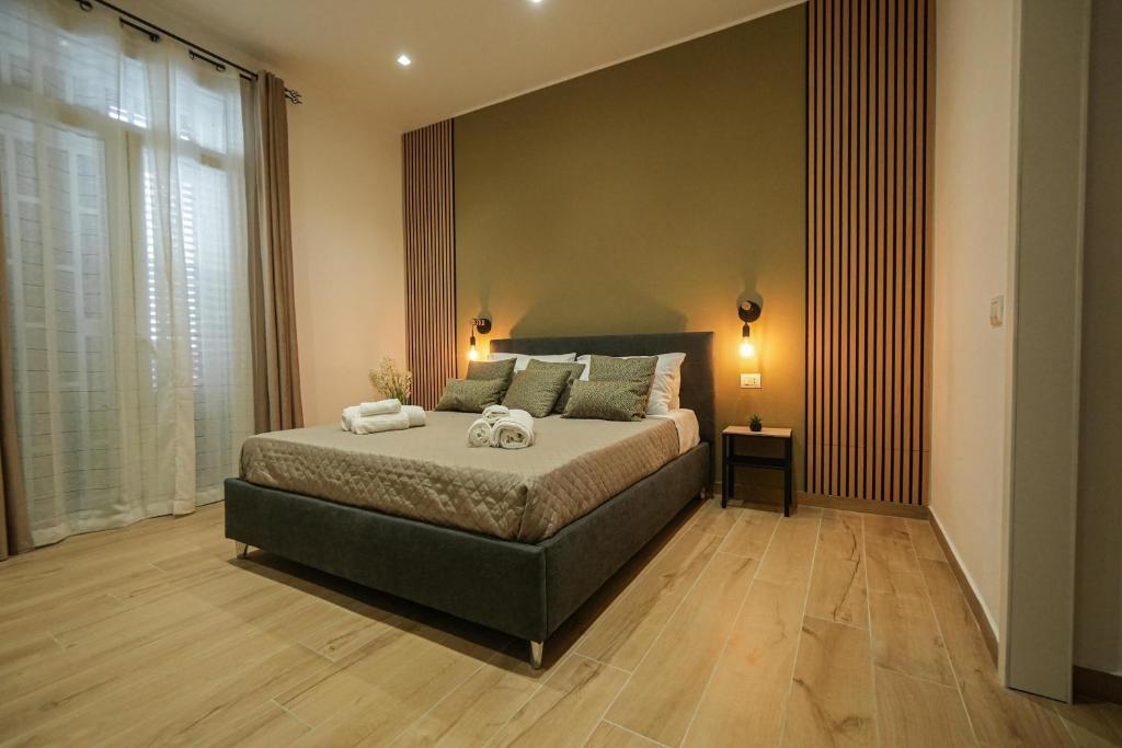 A bed or beds in a room at Beta Suite