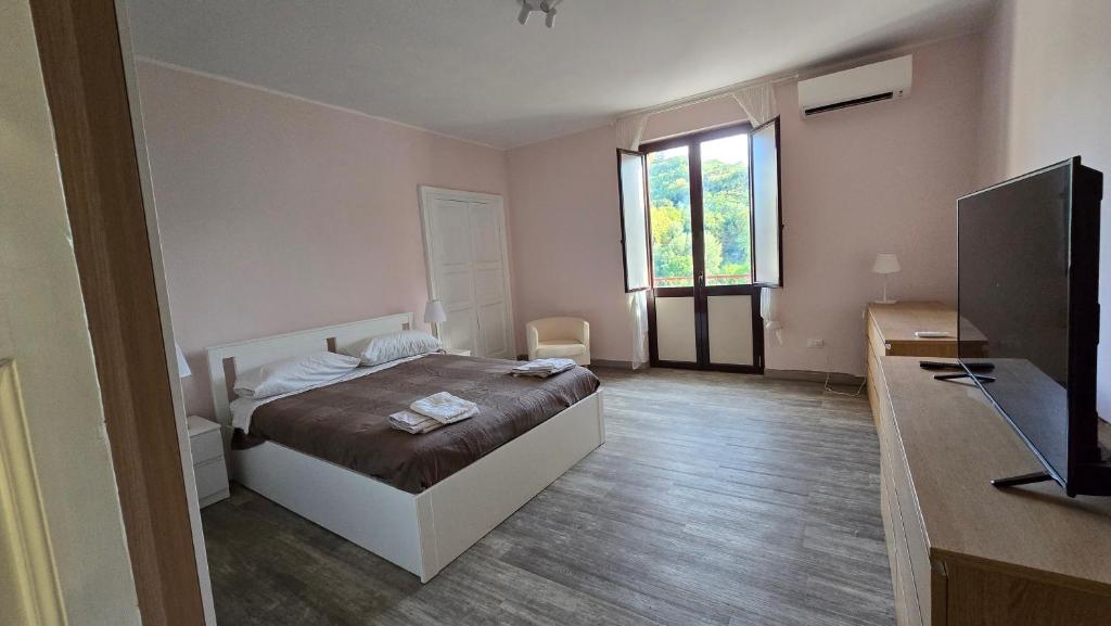 Ένα ή περισσότερα κρεβάτια σε δωμάτιο στο My Room Cosenza