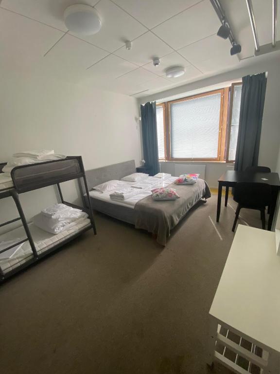 Aikatalo Hostel Helsinki - Classic Quadruple Room