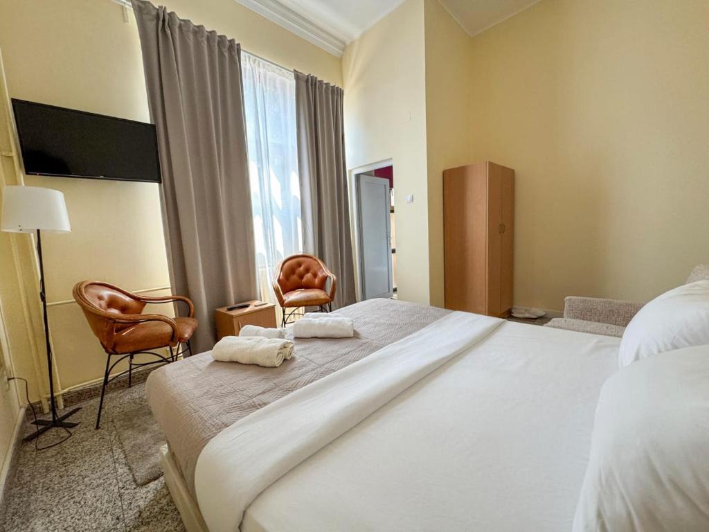 Ένα ή περισσότερα κρεβάτια σε δωμάτιο στο Vila club 011