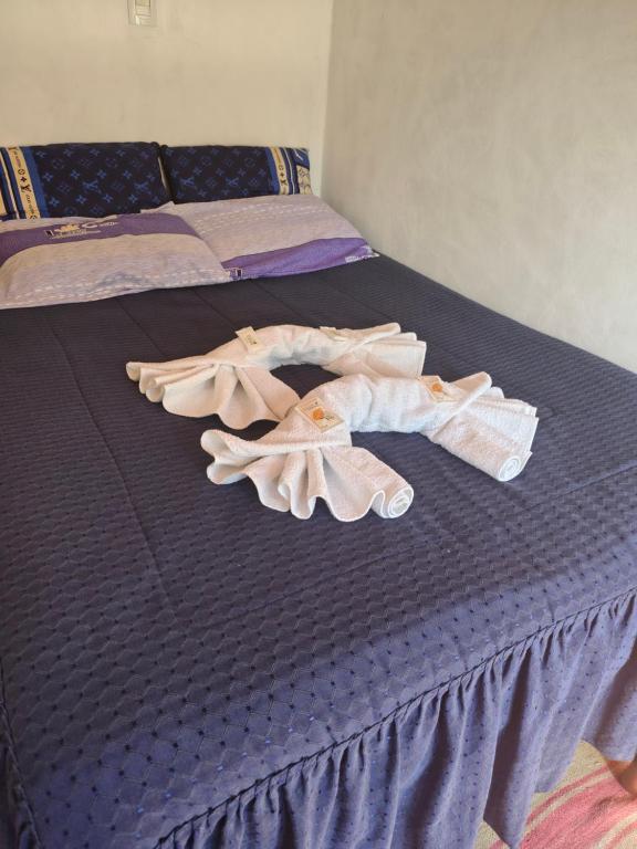Ένα ή περισσότερα κρεβάτια σε δωμάτιο στο Hostal del Luna